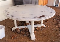 Round white painted dining table