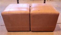 2 tan leather foot stools