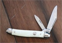 White handle Imperial pocket knife