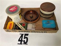 Flat of Tabaco Cans, Ashtray, etc.