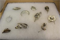 SELECTION OF SILVER COLORED BROOCHES