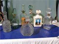 7 Whiskey decanters.