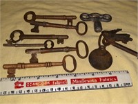 Brass skeleton keys, padlock keys.