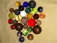 Glass and clay Marbles.