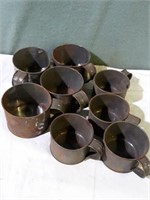 8 vintage tin cups.