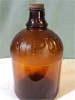 Brown glass Purex gallon jug.