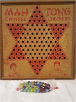 Chinese checker board with marbles.
