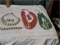 Necklaces and earrings.