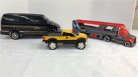 Chevrolet Astro toy van, hot wheels semi, and