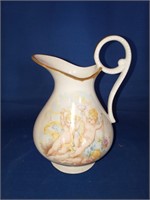 LIMOGES FRANCE SMALL PITCHER WITH CHERUBS