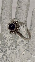 Sterling silver ring with purple gem