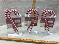 2 SETS OF CANDY CANE STOCKING HOLDERS