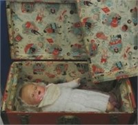 Vintage Baby Doll in Trunk