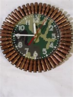 Battery operated wall clock with ammunition.