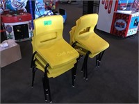 Eight yellow chairs could use a good cleaning