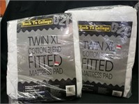 2) XL twin mattress pads