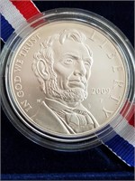 2009 Abraham Lincoln Uncirculated Silver Dollar
