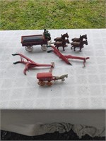Toy horse drawn plows and wagons