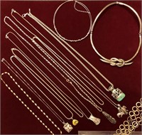 12 silver necklaces