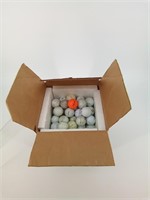 74 used golf balls