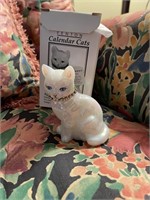 L -  Fenton Calender Cat Figurine