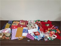 Christmas gift bags, ribbon, and more