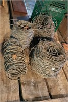 4 ROLLS OF BARBED WIRE