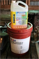 PARTIAL PAIL OF GEARLUBE AND WASHER FLUID