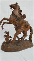 COPPER MAN WITH HORSE STATUE