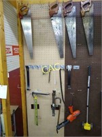 Pegboard Lot of Saws and Other Tools