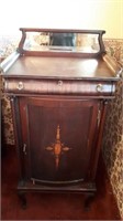 Antique record cabinet. With beveled mirror. 43.5x
