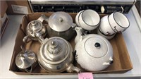 silver teapots and japanese teapot and cups