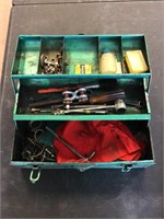 Green tool box with tools