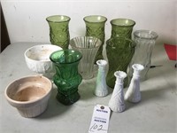 12 glass vases, various sizes