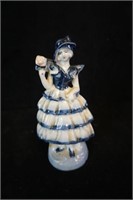 Lady in Blue and White Ruffle Dress Figurine