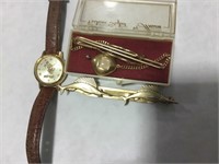 Pair of Anson tie clasps and a Lorus Mickey watch