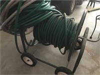 Wheeled hose cart and misc. garden hoses