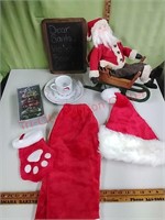 Santa in sleigh, holiday decor & Santawear