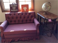 Loveseat, globe, and antique table