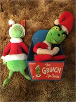 Two stuffed grinch toys