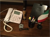 AT&T telephone, flashlight, stopwatch,