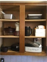 Contents of cabinet including cookware waffle