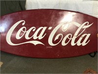 Very large metal Coca-Cola advertising sign