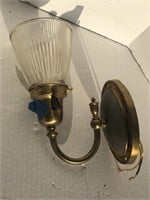 Wall sconce with glass globe
