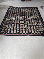 penny rug with circle design 8 1/2 “