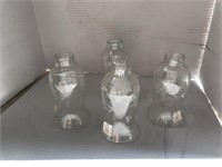Group of four glass lampshades