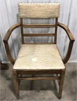 Wooden arm chair w/ rivet detail