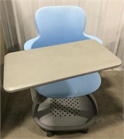 Wheelable desk with chair attached