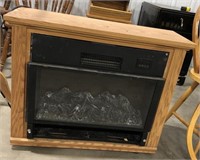 Roll N Glow Electric Fireplace, measures 32in x