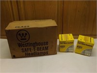 A Dozen Westinghouse 4001 Headlamps
